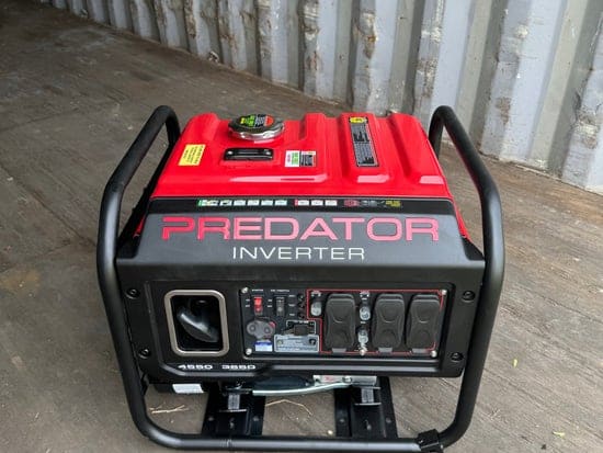 Red Predator portable generator with a black carry frame